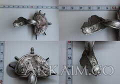 фибула с сюжетом